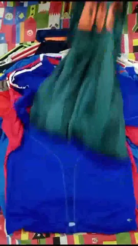 Football club T-shirt.